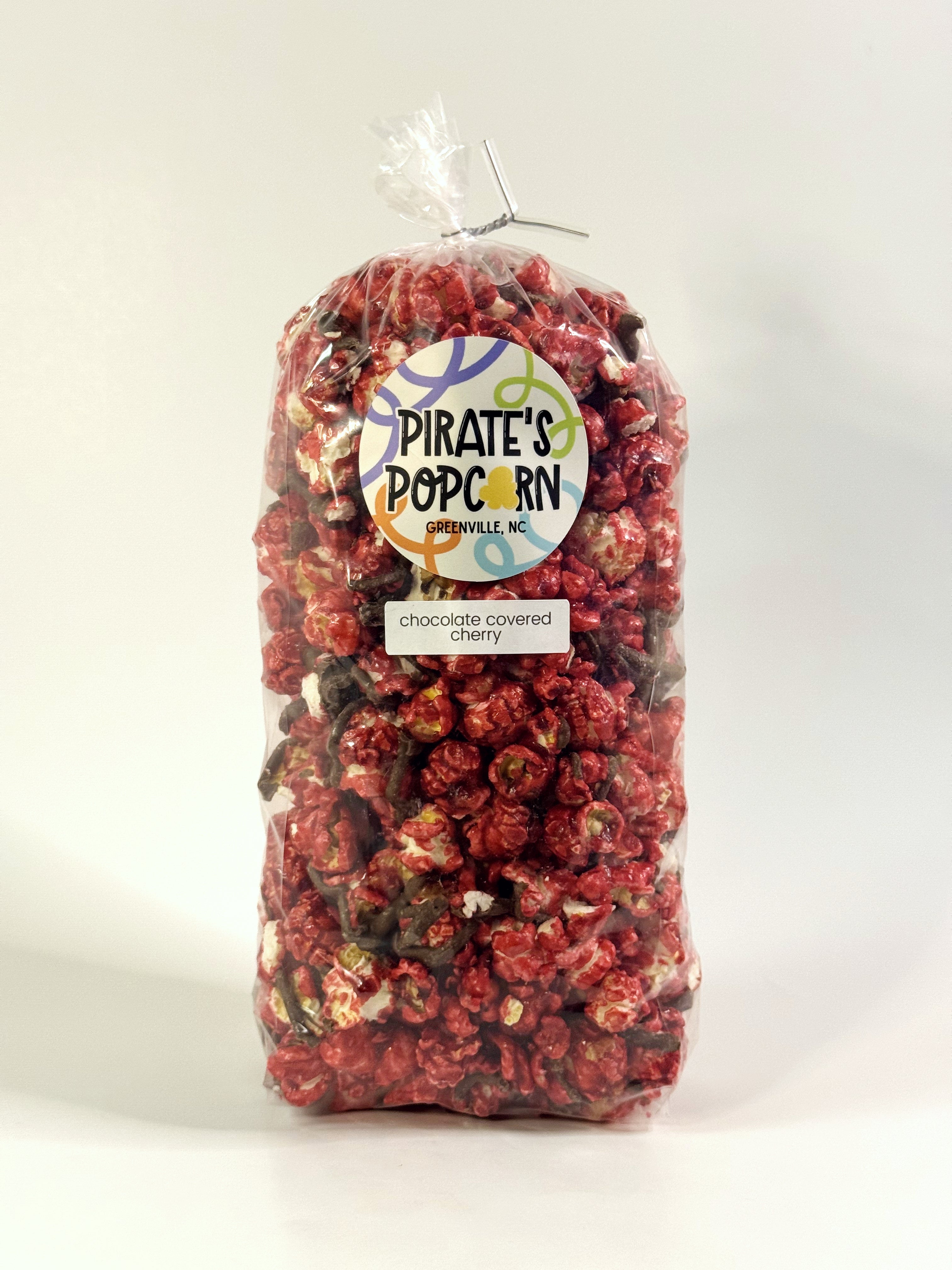Bag of Pirate's Popcorn with cherry flavor on a white background gourmet popcorn gift