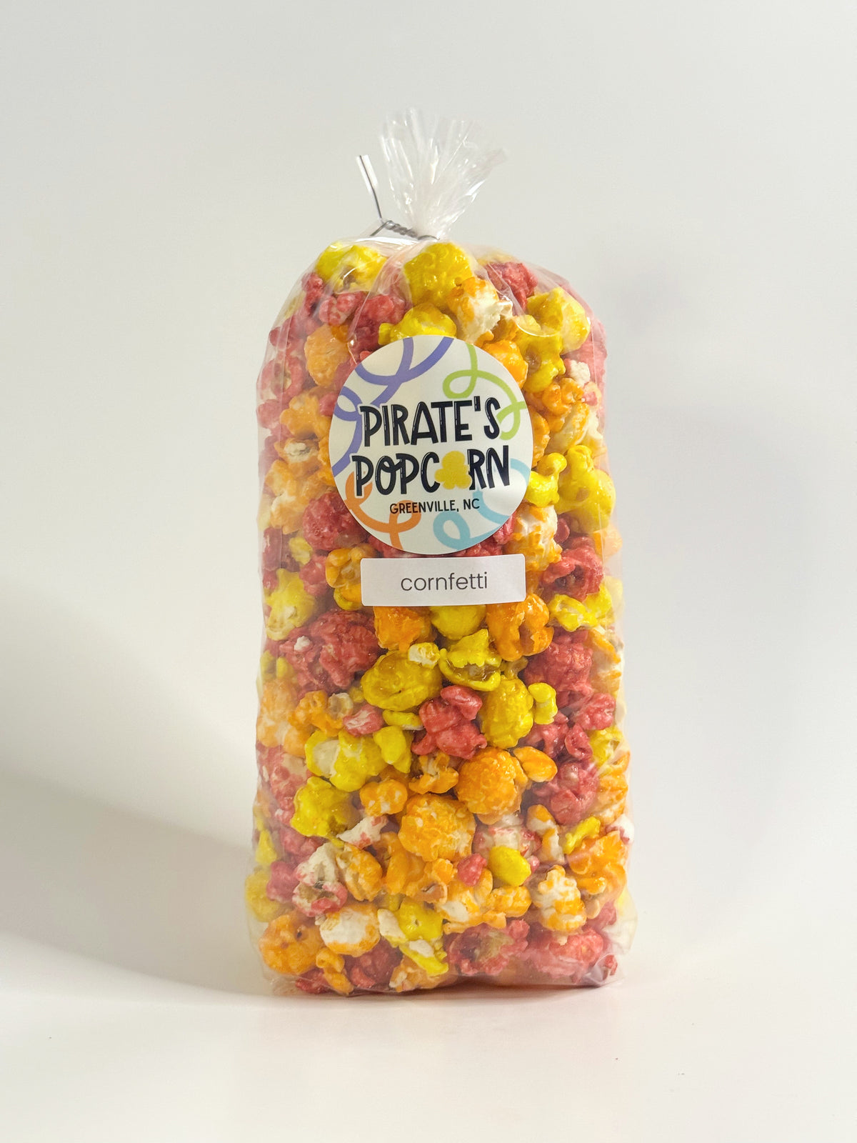 Bag of Pirate's Popcorn confetti on a white background gourmet popcorn gift bag