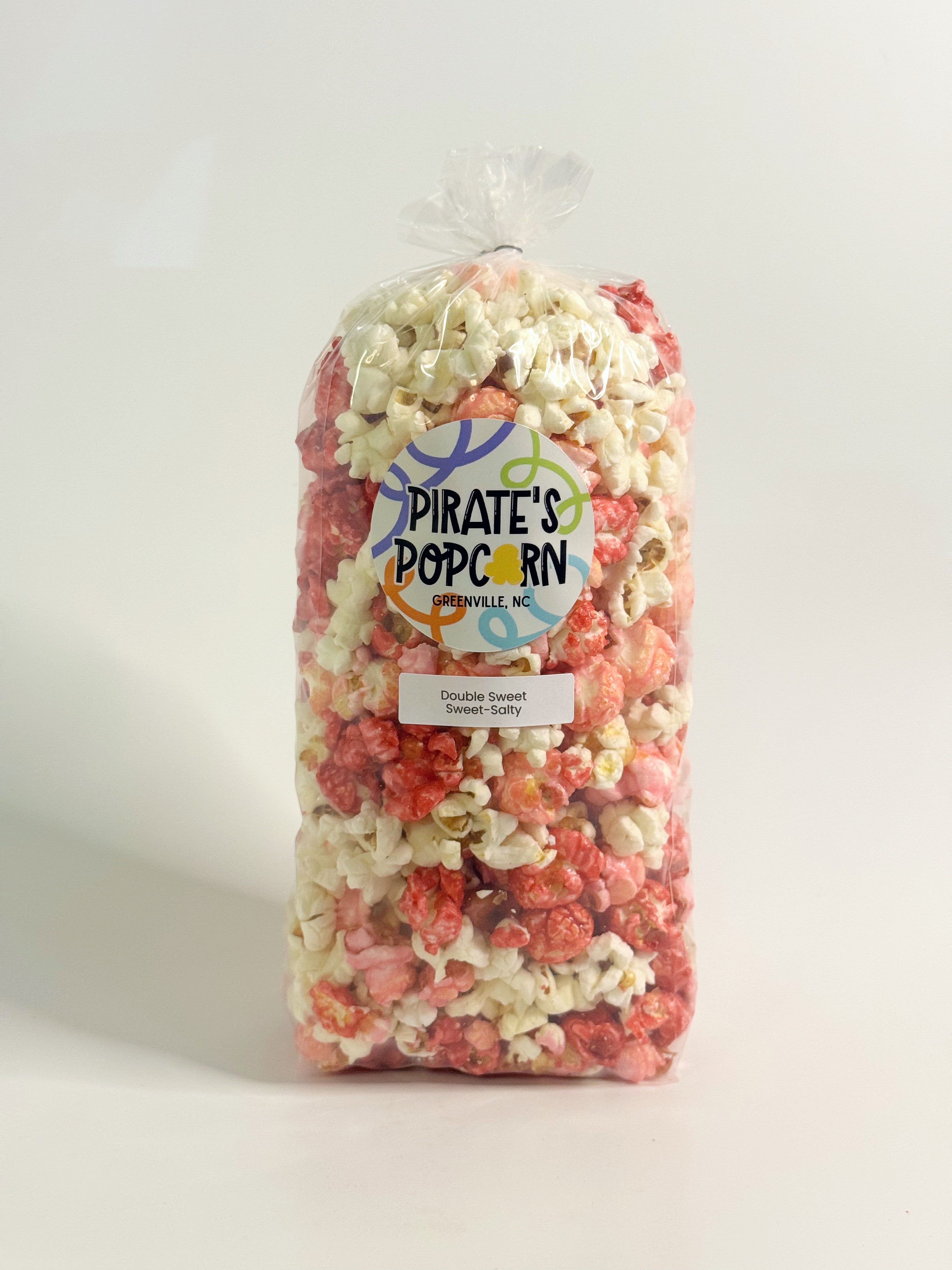 Bag of Pirate's Popcorn with colorful popcorn on a white background gourmet popcorn gift bag